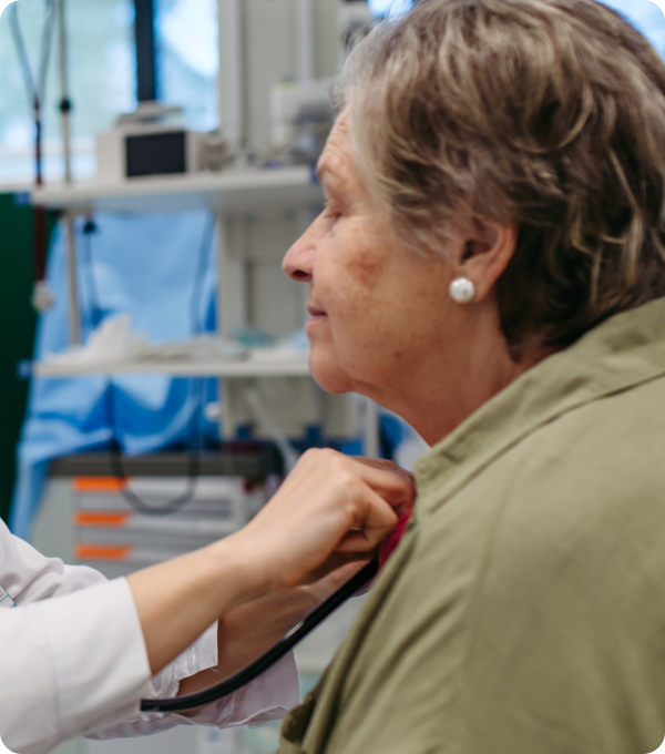 Close up of patient being attended to by GP